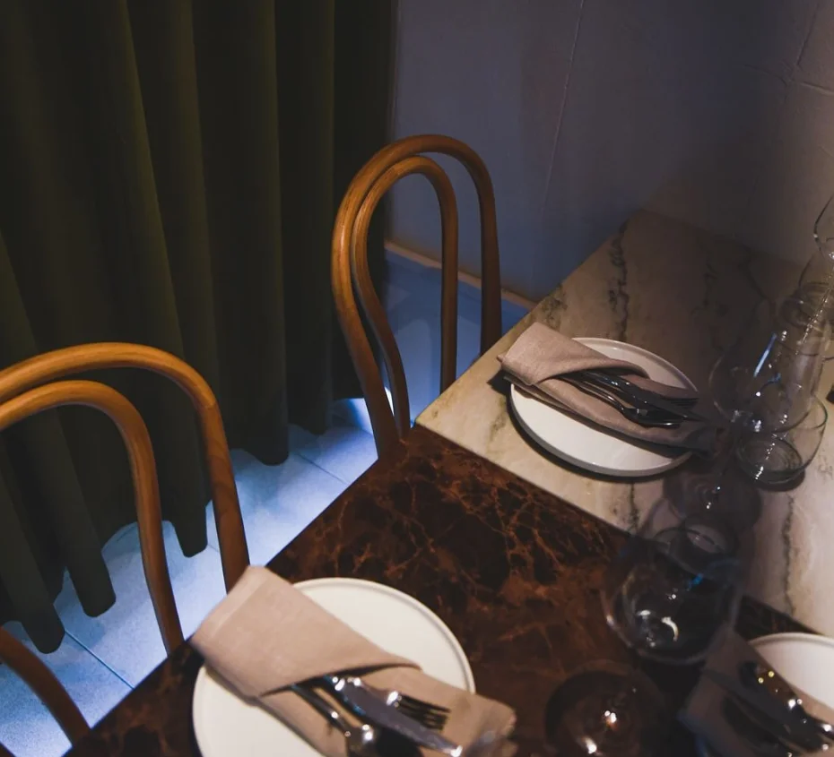 Takam restaurant interior with marble countertop design.